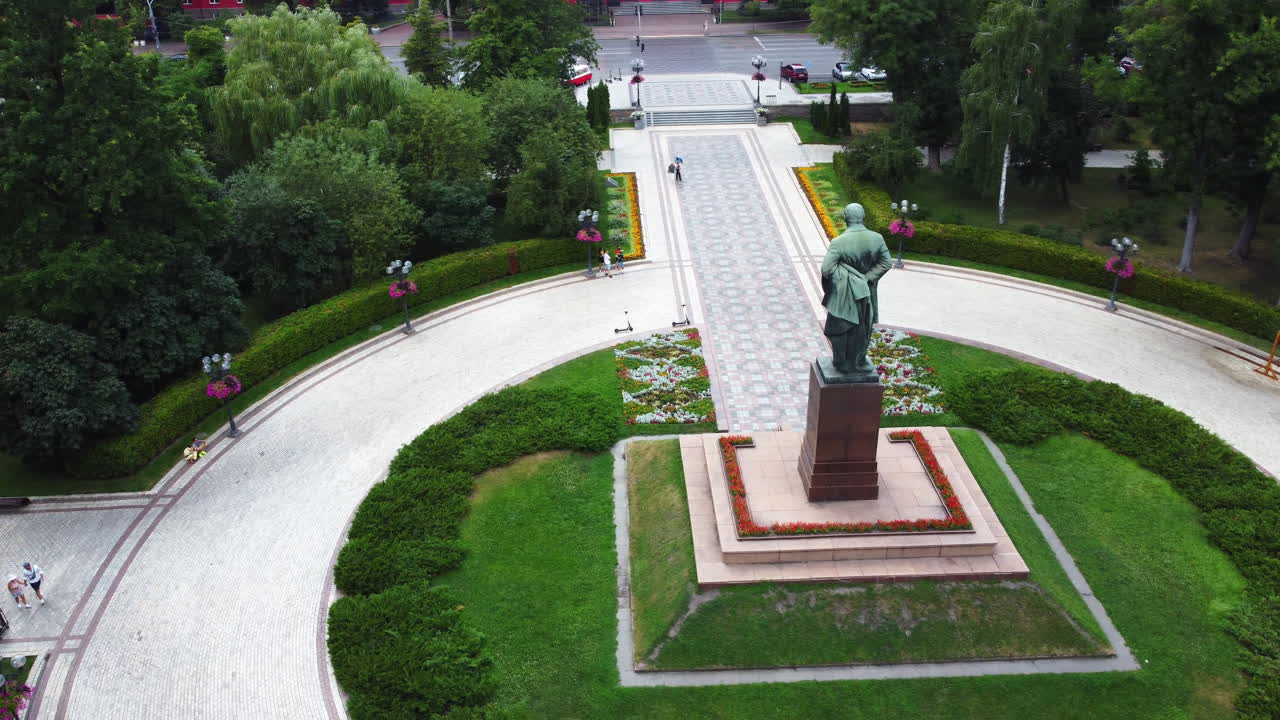 Aerial view of Taras Shevchenko statue in park, in front of Kyiv National University of Taras Shevchenko. Ukraine, historical landmark