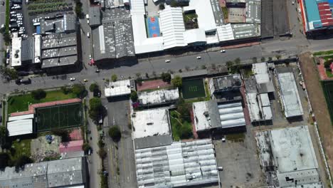 In-the-foreground,-the-abandoned-liquor-factory-stands-as-a-silent-sentinel