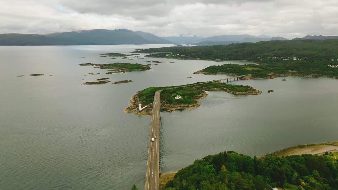 Connecting Scotland's Highlands to Islands: Aerial Sweep of Skye Bridge, Kyle of Lochalsh and Loch Alsh in Scotland, United Kingdom