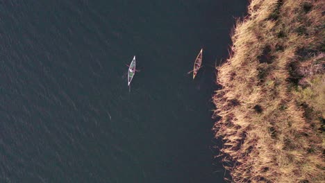 boatmen finishing their day at work in zirahuén´s lake