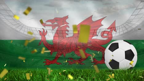 Animation-of-flag-of-wales-and-football-over-confetti-and-stadium