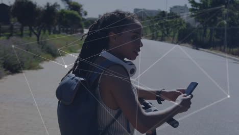 animation of network of connections over woman using smartwatch standing on her scooter