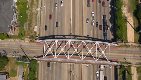 Birds-eye-view-of-car-traffic-on-59-South-freeway-in-Houston,-Texas