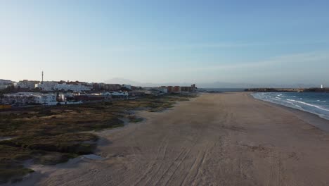 Majestic-Sea-Side-View-with-Buildings-of-Andalucian-Town-and-Clear-Blue-Sky-Morning-by-Drone-in-4K