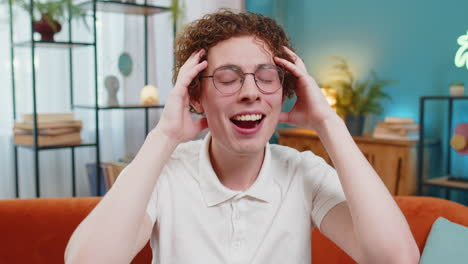 Man-surprised-looking-at-camera-with-big-eyes-shocked-by-victory-good-win-news-celebrating-wow