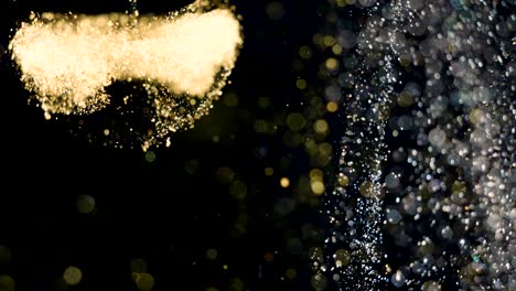 elegant, detailed, and golden particles flow with shallow depth of field underwater