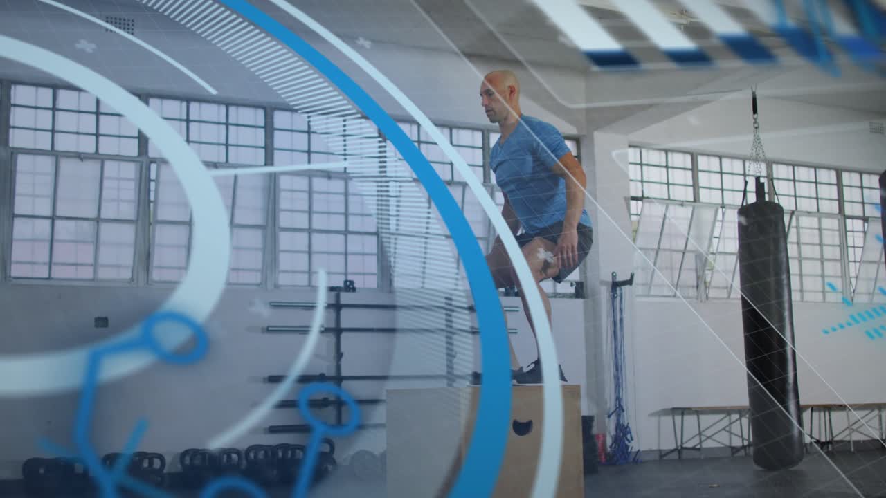 Man steadying, swinging arms and jumping off plyo box, landing, resetting, blue HUD showing fitness