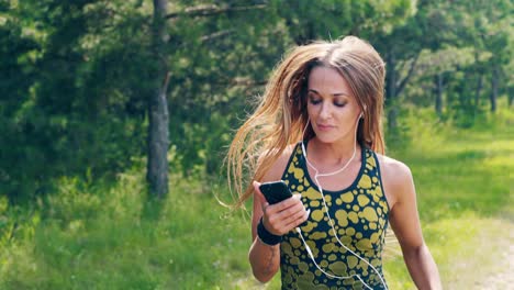 cu portrait young girl goes in for sports in the morning runs