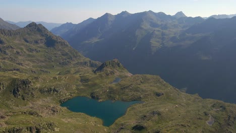 Drone-footage-of-a-distant-lake-in-the-Pyrenees-mountains