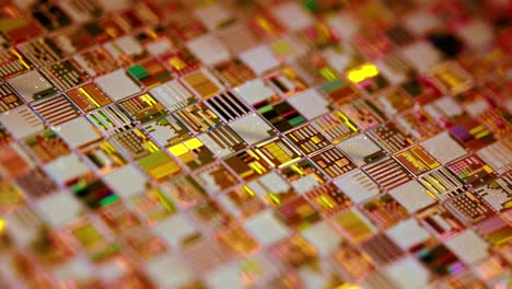 Silicon-semiconductor-wafer-close-up.-In-electronics,-a-wafer-also-called-a-slice-or-substrate-is-a-thin-slice-of-semiconductor,-a-crystalline-silicon,-used-for-the-fabrication-of-integrated-circuits