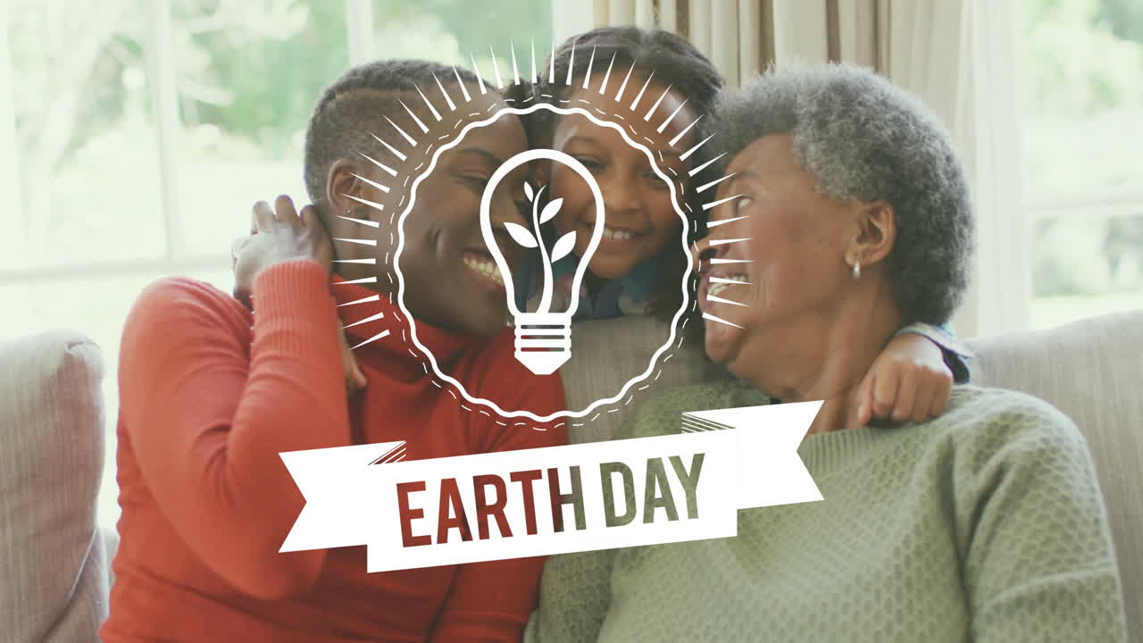 Earth Day light bulb animation over family hugging and smiling on couch
