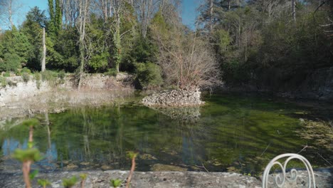 Beautiful-turqouise-pond-in-the-back-garden-of-a-castle-in-Southern-France