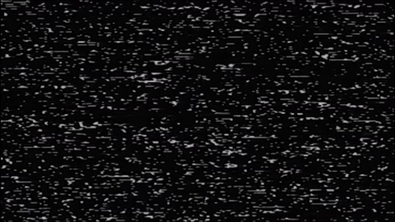 Authentic VHS tape noise with heavy static, color bleeding, and glitch effects. Seamless loop for creating a retro 80s or 90s television look. Use as an overlay or background