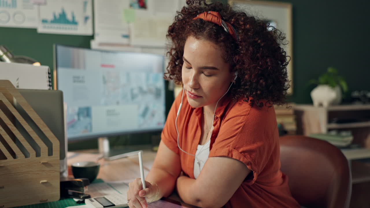 Woman working at her desk in home office