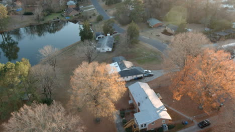 suburb house powered with solar panel renewable energy, aerial