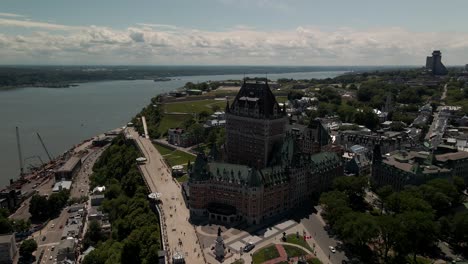 slow spinning shot of hotel chateau frontenac during warm holiday, aerial