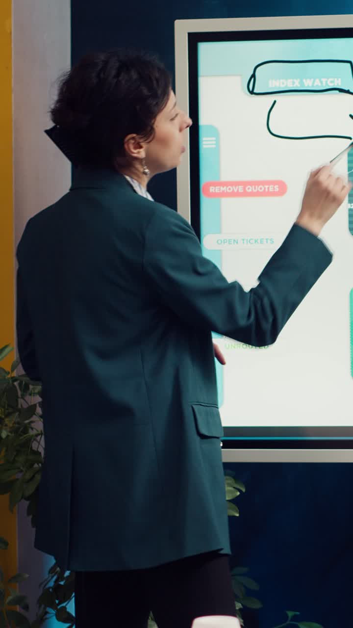Businesswoman Presenting on Interactive Whiteboard in Modern Office