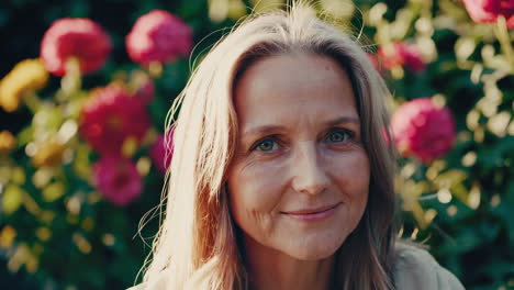 smiling senior woman in garden