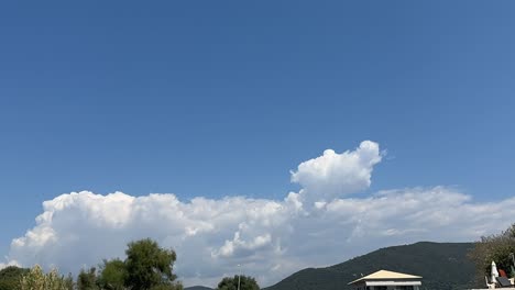 time lapse of clouds over a mountain in greece in the summer