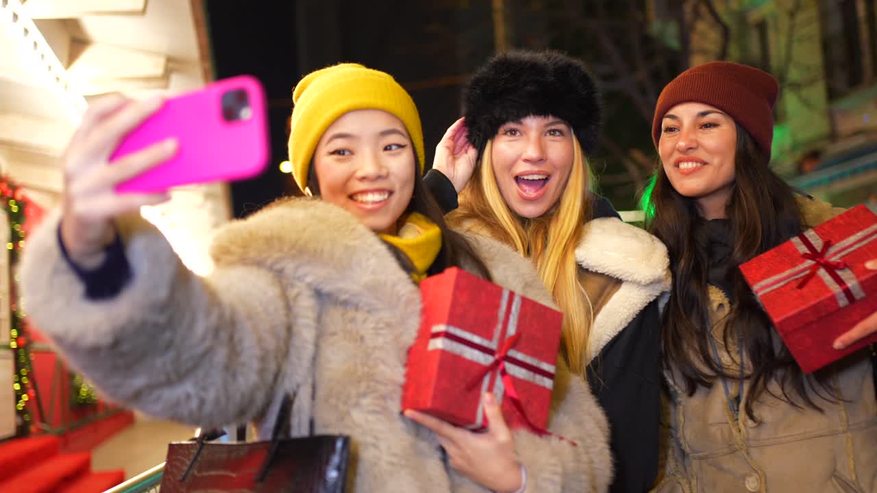 Friends celebrating with gifts taking a selfie