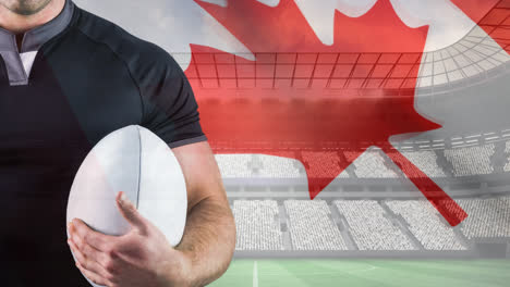 canadian rugby player holding rugby ball with flag waving