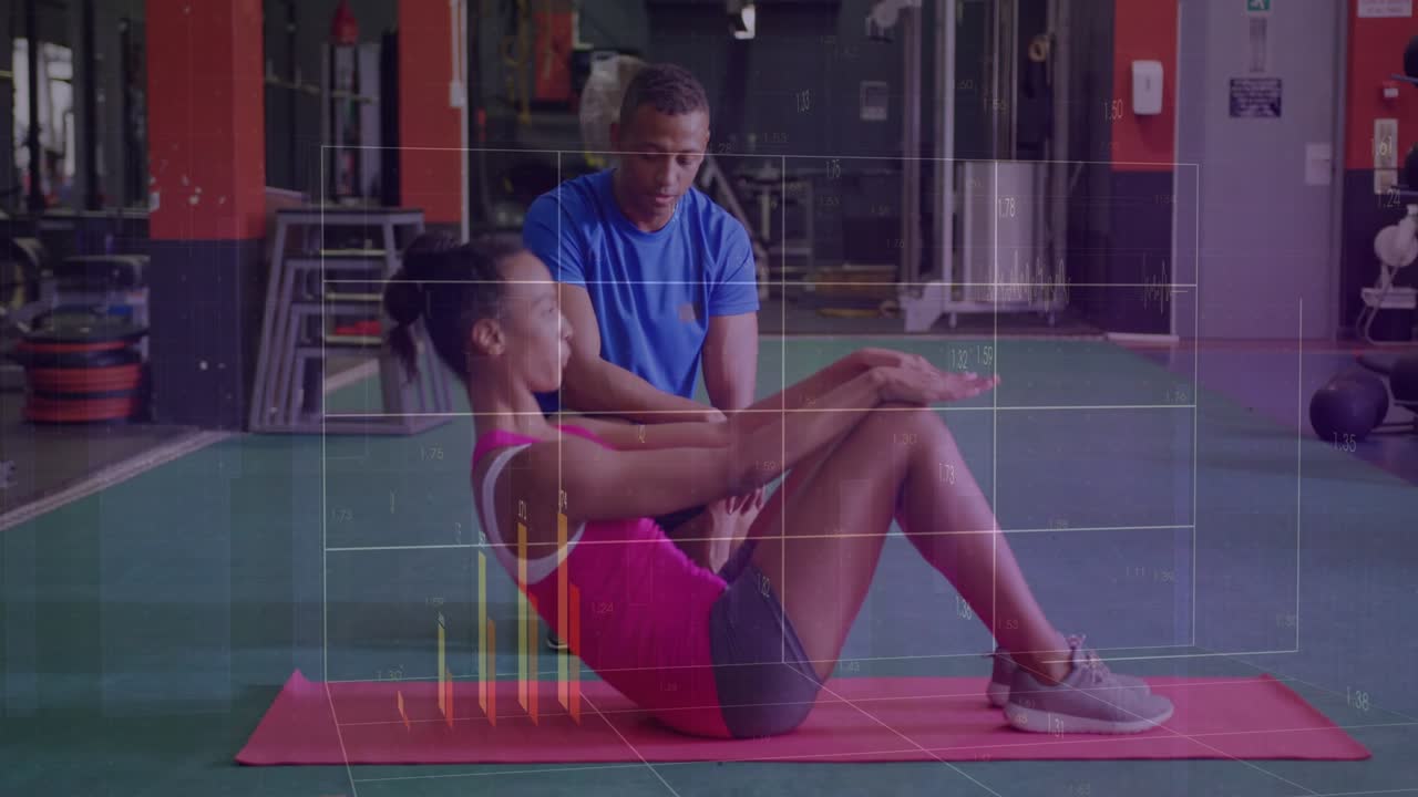 Trainer cueing client doing crunches for core fitness on red mat touching legs overlays rising