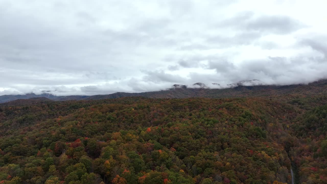 Aerial reverse reveal of mountains in North Carolina