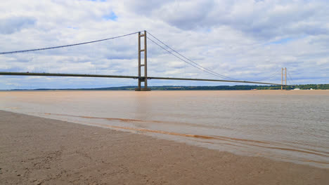 aerial shot: humber bridge, river, traffic, lincolnshire to humberside