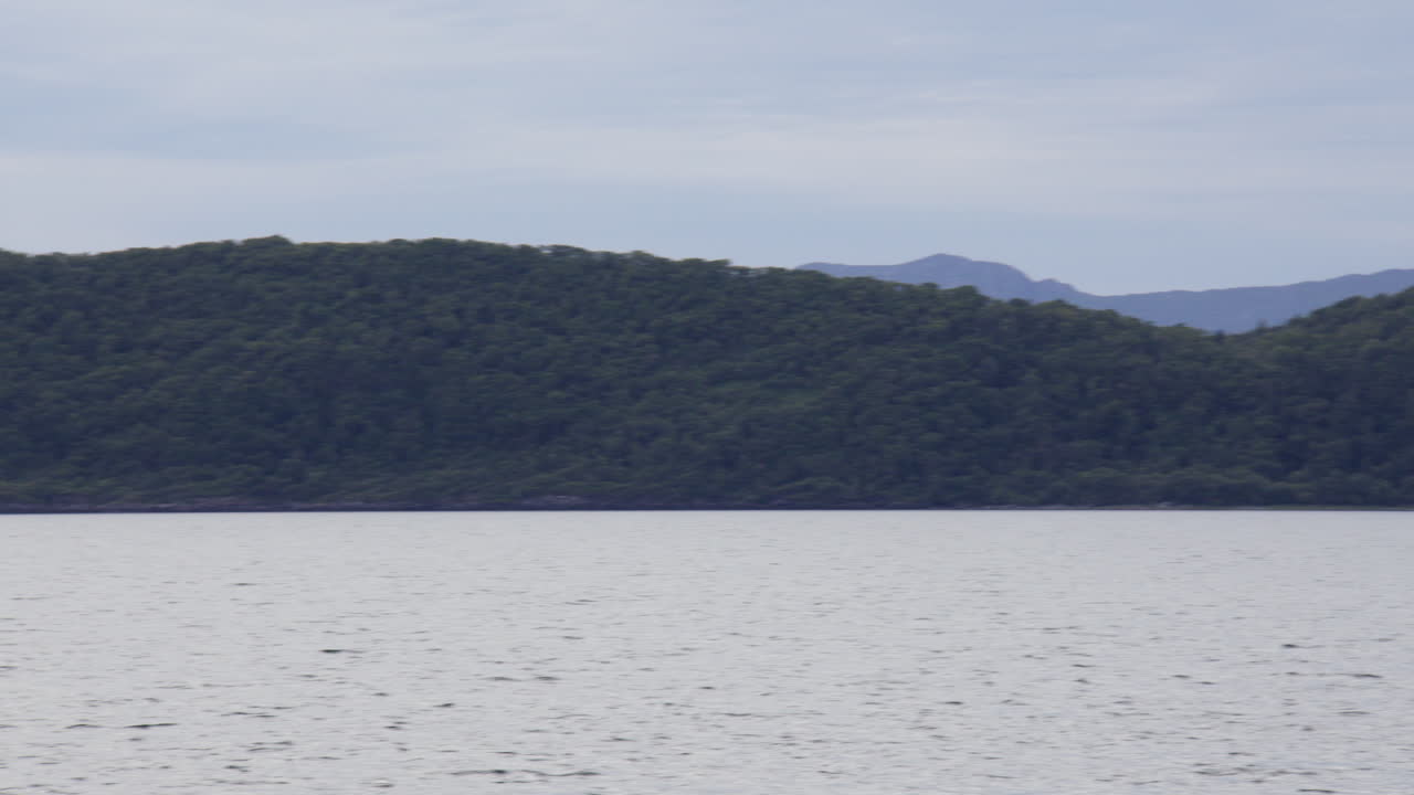 Panning shot to the land West of Ardmucknish Bay, Lochnell,