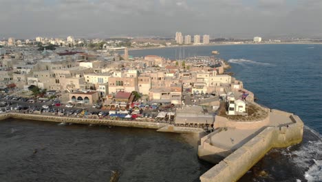 aerial footage over the old city of acre and the mediterranean sea