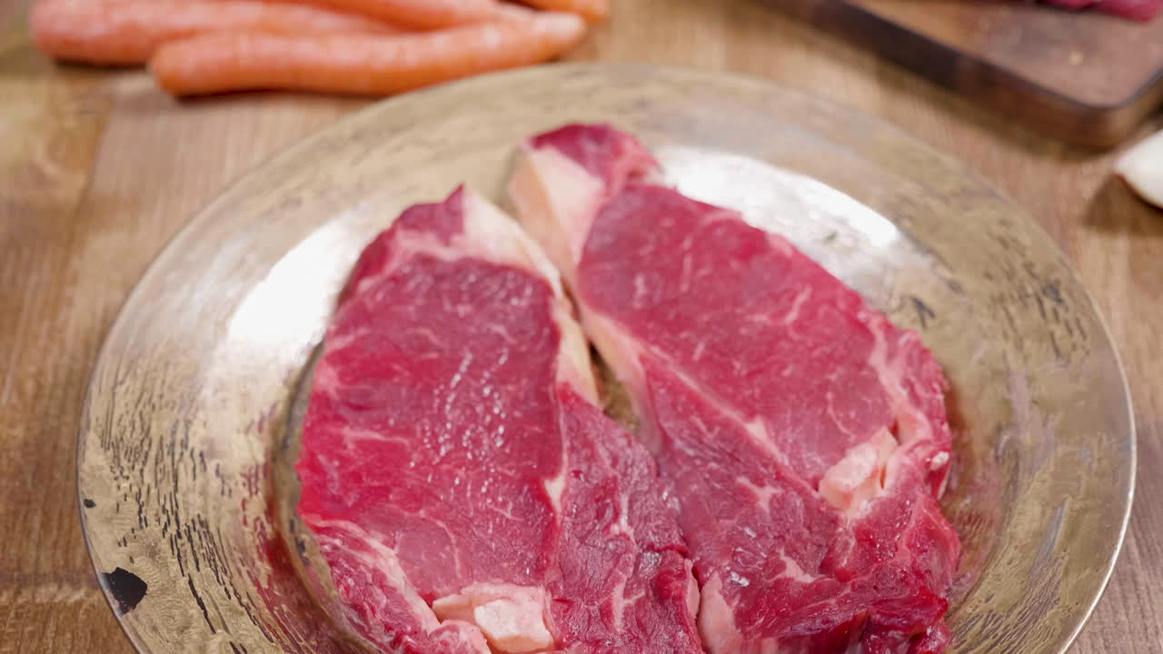 Raw steak and vegetables