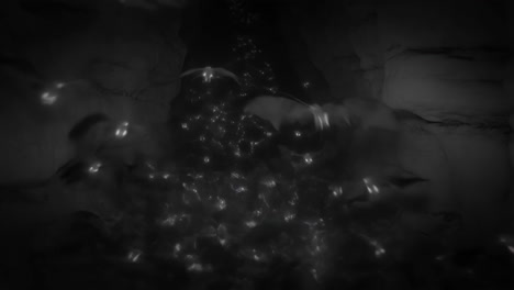 Ethereal Bioluminescent Lights in a Dark Cave