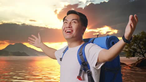 close up side view of asian male hiker with mountaineering backpack spreading arms enjoy looking the view around at a lake