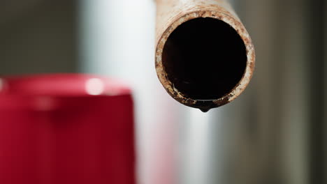 leaking oil from rusty pipe