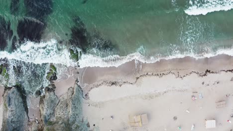 Top-down-view-of-big-waves-near-rocks-in-the-Black-sea