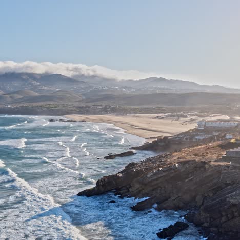 aerial shot of an empty lonely sandy beach at the atlantic ocean