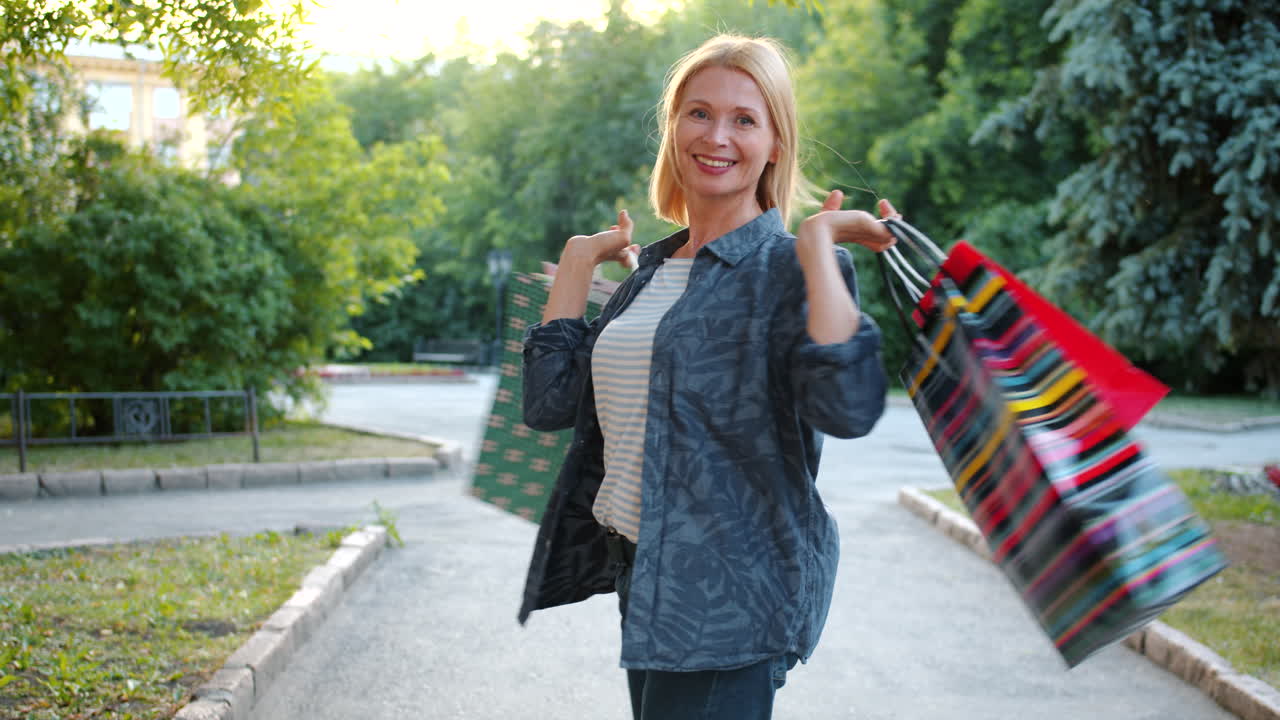 Smiling Woman with Shopping Bags