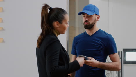 delivery guy bringing takeaway food meal holding pos terminal service in startup business company