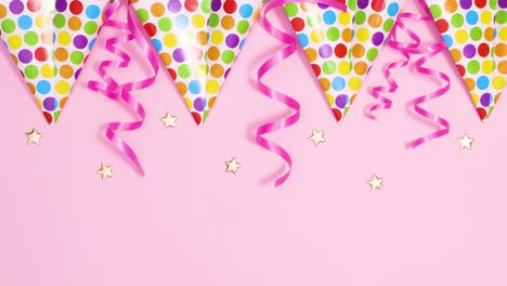 happy birthday candles appear under the flag banners with ribbons. stop motion