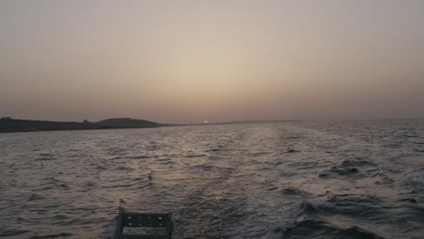 Boat-In-The-Sea-At-Sun-set