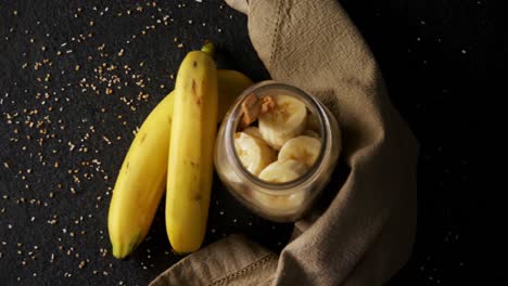 slice of banana in jar with banana 4k