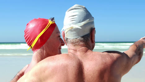 senior couple enjoying together at the beach