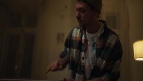 man painting at night