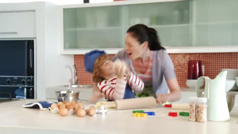 mother and son cooking together