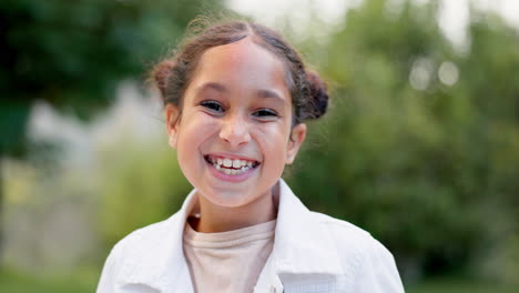 Child,-face-and-girl-laughing-outdoor-in-a-garden