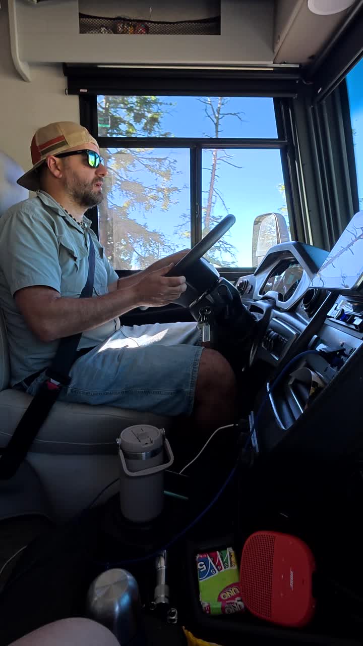 Man Driving an RV on a Sunny Road Trip