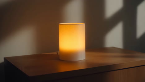 modern cylinder lamp on wooden table