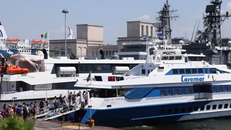 passengers boarding a ferry at naples port