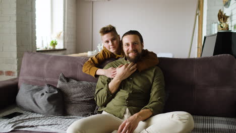 Caucasian-man-sitting-on-sofa