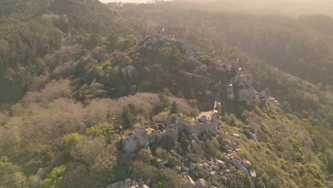 Aerial-shot-overhead-the-ruined-walls-protecting-Castelo-dos-Mouros-in-Portugal